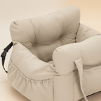 Kodi & Co. beige cushioned dog car booster seat with soft padded walls and adjustable safety straps