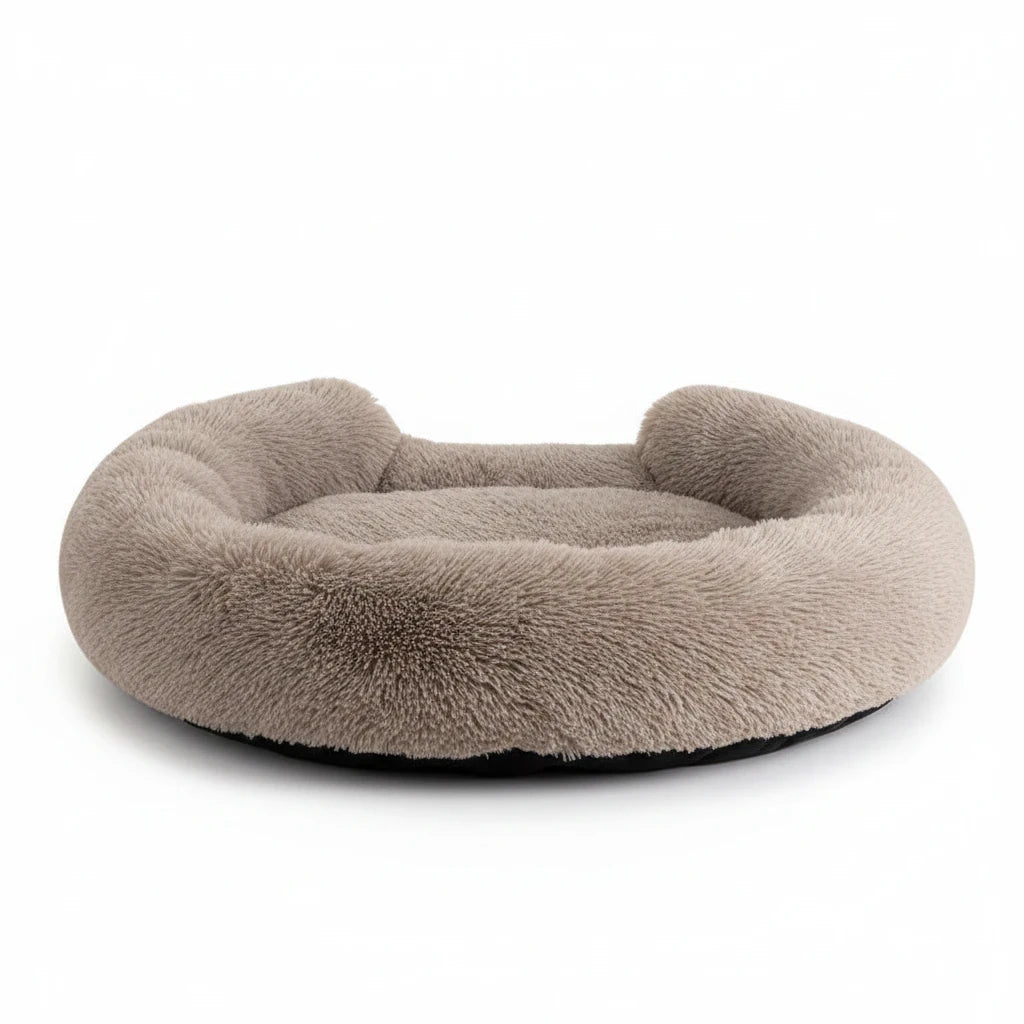 Kodi & Co. Kodi Plush Bed in beige, a round, ultra-soft, and cosy nest-style dog bed with raised cushioned walls.