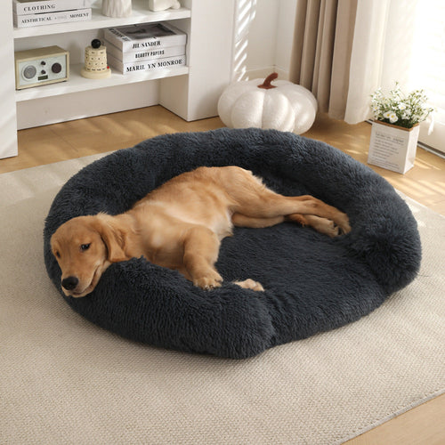 Golden retriever resting in a dark gray Kodi & Co. plush round dog bed with raised walls on a living room rug.