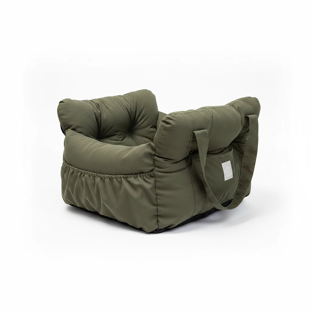 Kodi & Co. olive green cushioned dog car booster seat with soft padded walls for secure and comfortable travel.