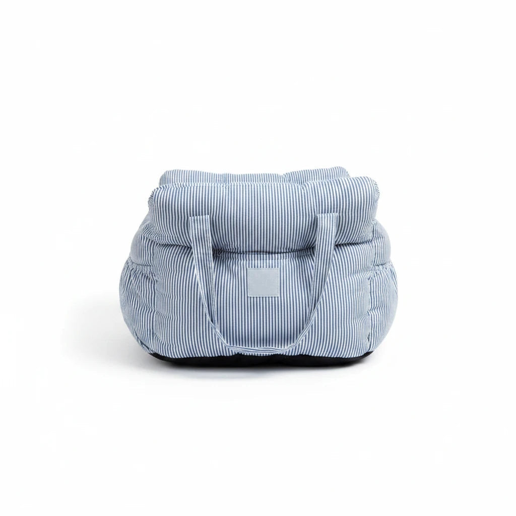 Kodi & Co. blue and white striped dog car booster seat with soft cushioned walls for a comfortable ride.